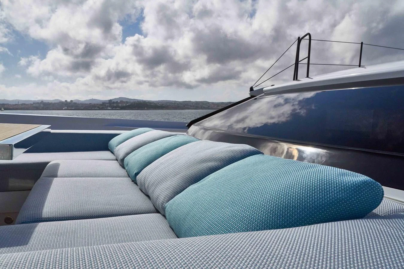 The sundeck features plush, inviting lounge seating with a stunning view of the water. aboard KAPUSHA Yacht for Sale