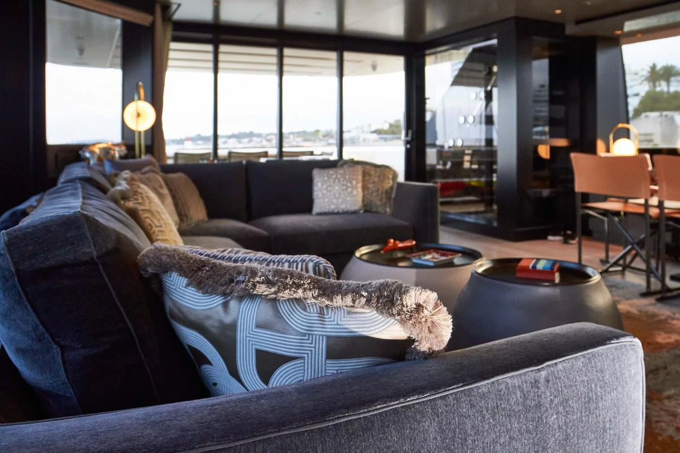 The yacht's interior features a luxurious and comfortable seating area with modern decor. aboard KAPUSHA Yacht for Sale