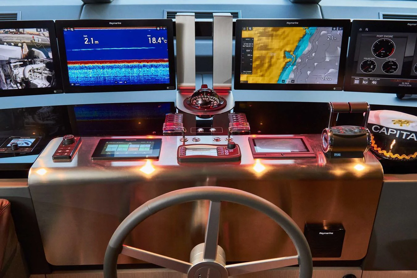 The helm station features advanced navigation and control systems for precise yacht management. aboard KAPUSHA Yacht for Sale