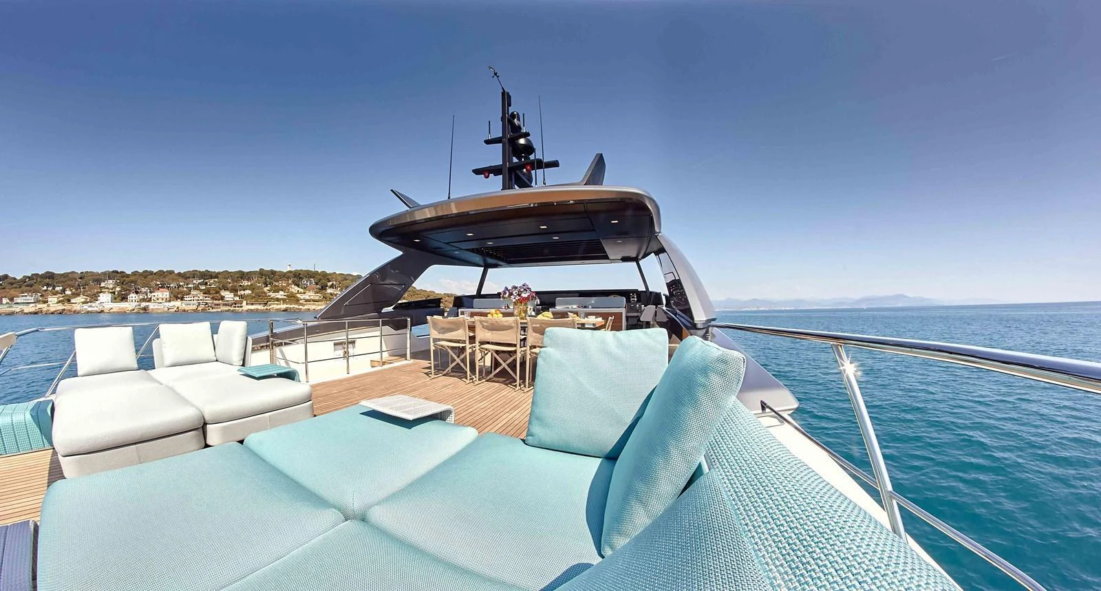 The yacht's sundeck offers luxurious lounging with stunning sea views. aboard KAPUSHA Yacht for Sale