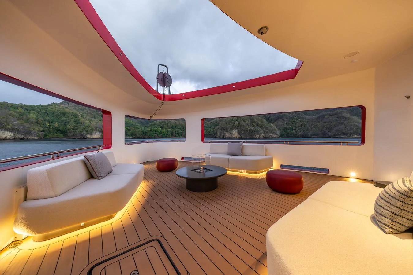 The spacious salon offers panoramic views and comfortable seating with a modern design. aboard AKULA Yacht for Sale