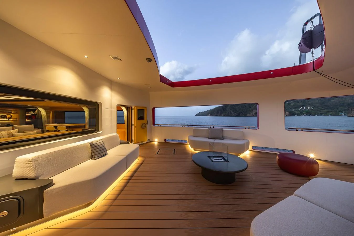 The spacious salon offers a luxurious and comfortable setting with panoramic views. aboard AKULA Yacht for Sale