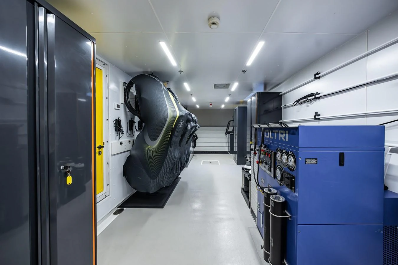 A well-equipped technical room featuring advanced machinery and equipment storage. aboard AKULA Yacht for Sale