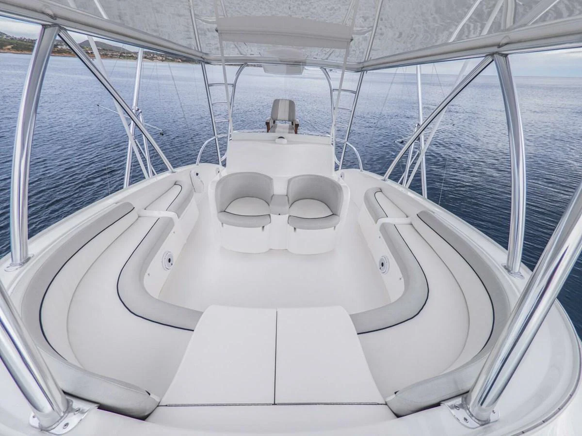 The flybridge offers a spacious seating area with panoramic views of the water. aboard MARLIN MAGIC Yacht for Sale
