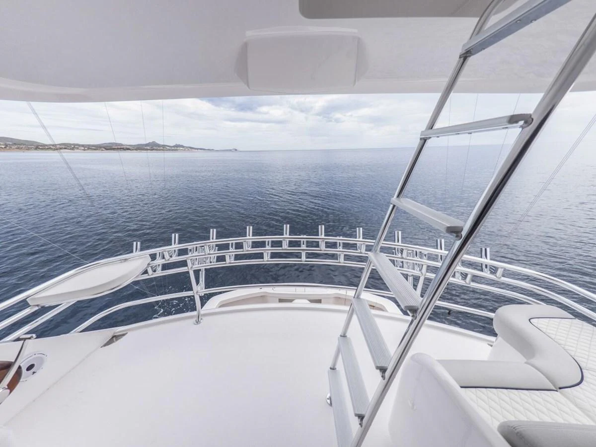 The flybridge offers a serene view of the open sea, perfect for relaxation. aboard MARLIN MAGIC Yacht for Sale