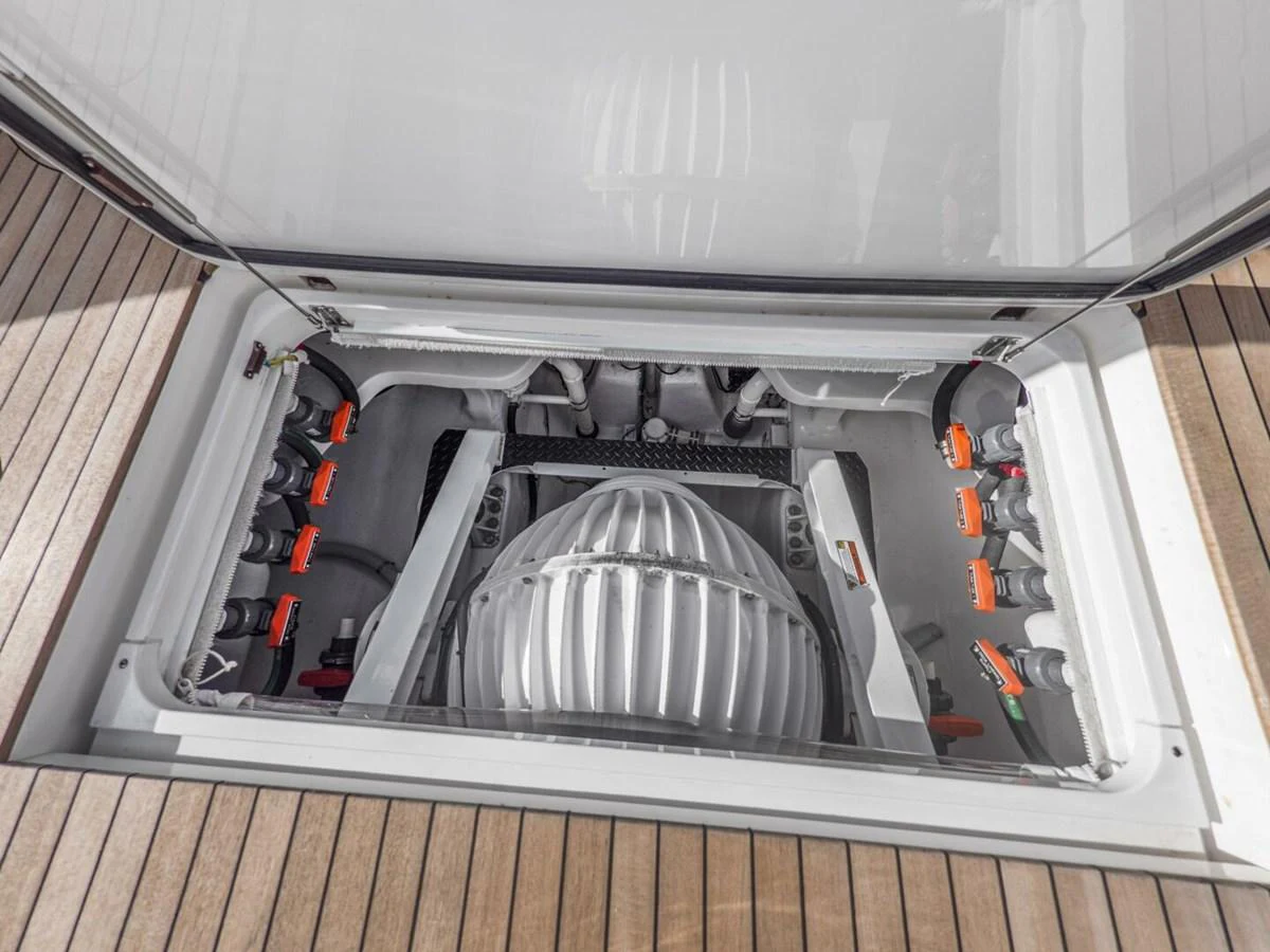 A detailed view of the yacht's engine compartment showcasing its mechanical components. aboard MARLIN MAGIC Yacht for Sale