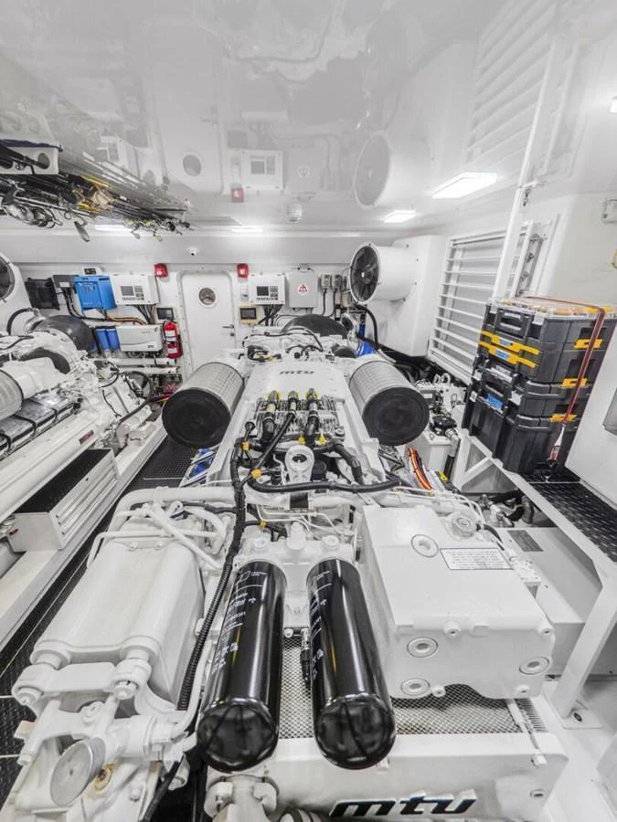 The image showcases the yacht's well-organized and high-tech engine room. aboard MARLIN MAGIC Yacht for Sale