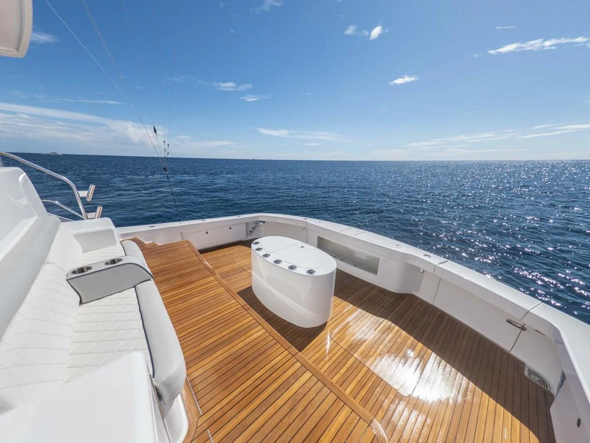 The aft deck offers a spacious and inviting area for relaxation with stunning ocean views. aboard MARLIN MAGIC Yacht for Sale