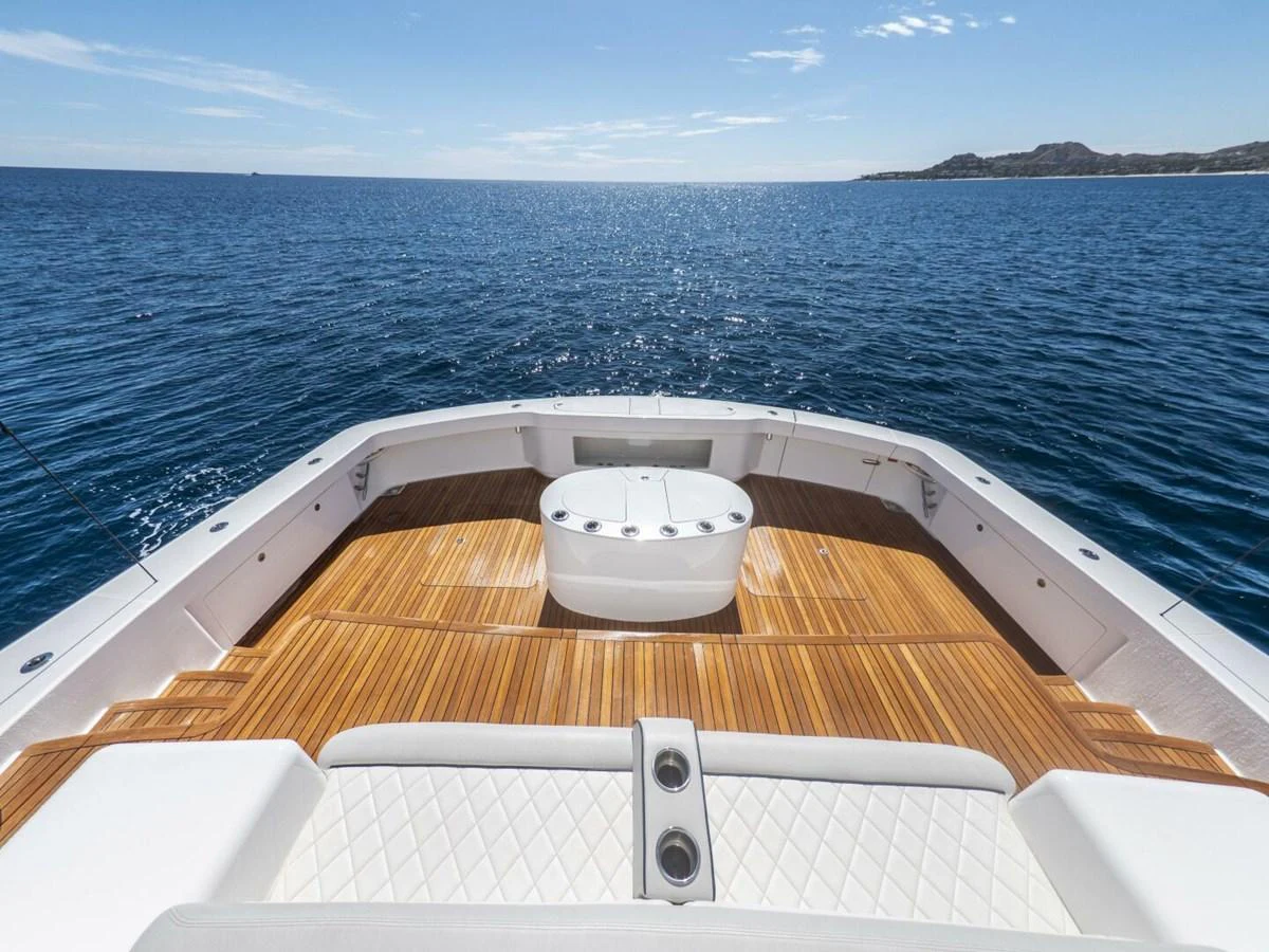 The yacht's aft deck offers a spacious and inviting area with stunning ocean views. aboard MARLIN MAGIC Yacht for Sale