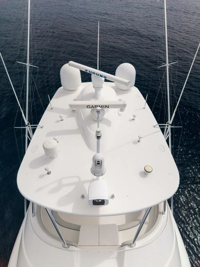 A detailed view of the yacht's flybridge with advanced navigation equipment. aboard MARLIN MAGIC Yacht for Sale