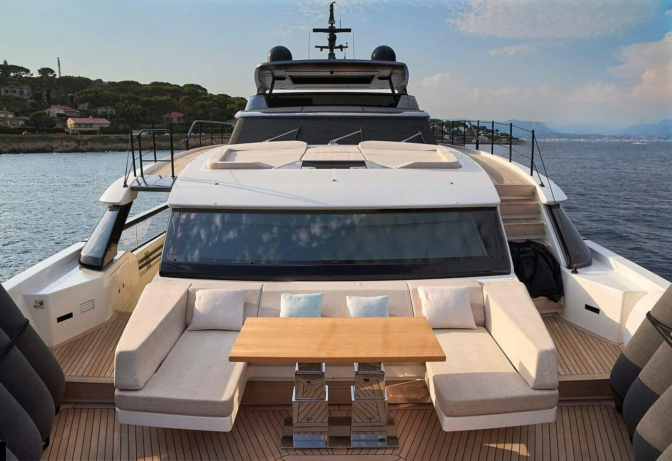 The foredeck of this yacht features a luxurious seating area with a central table, perfect for enjoying the scenic views. aboard SANLORENZO SL102 ASYMMETRIC Yacht for Sale