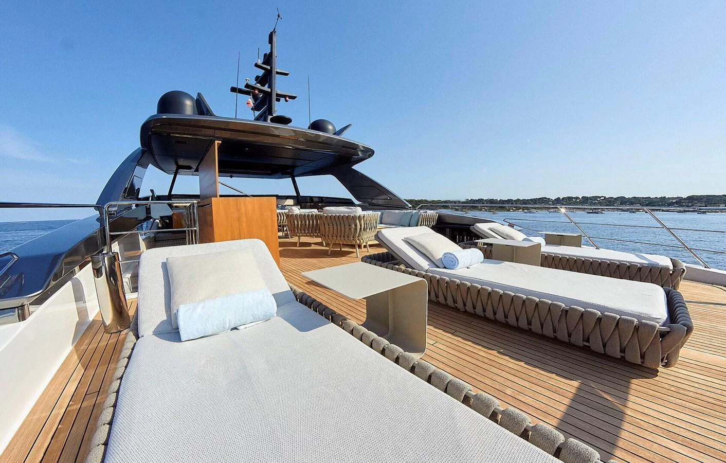 The sundeck offers luxurious sun loungers and a serene view of the water. aboard SANLORENZO SL102 ASYMMETRIC Yacht for Sale