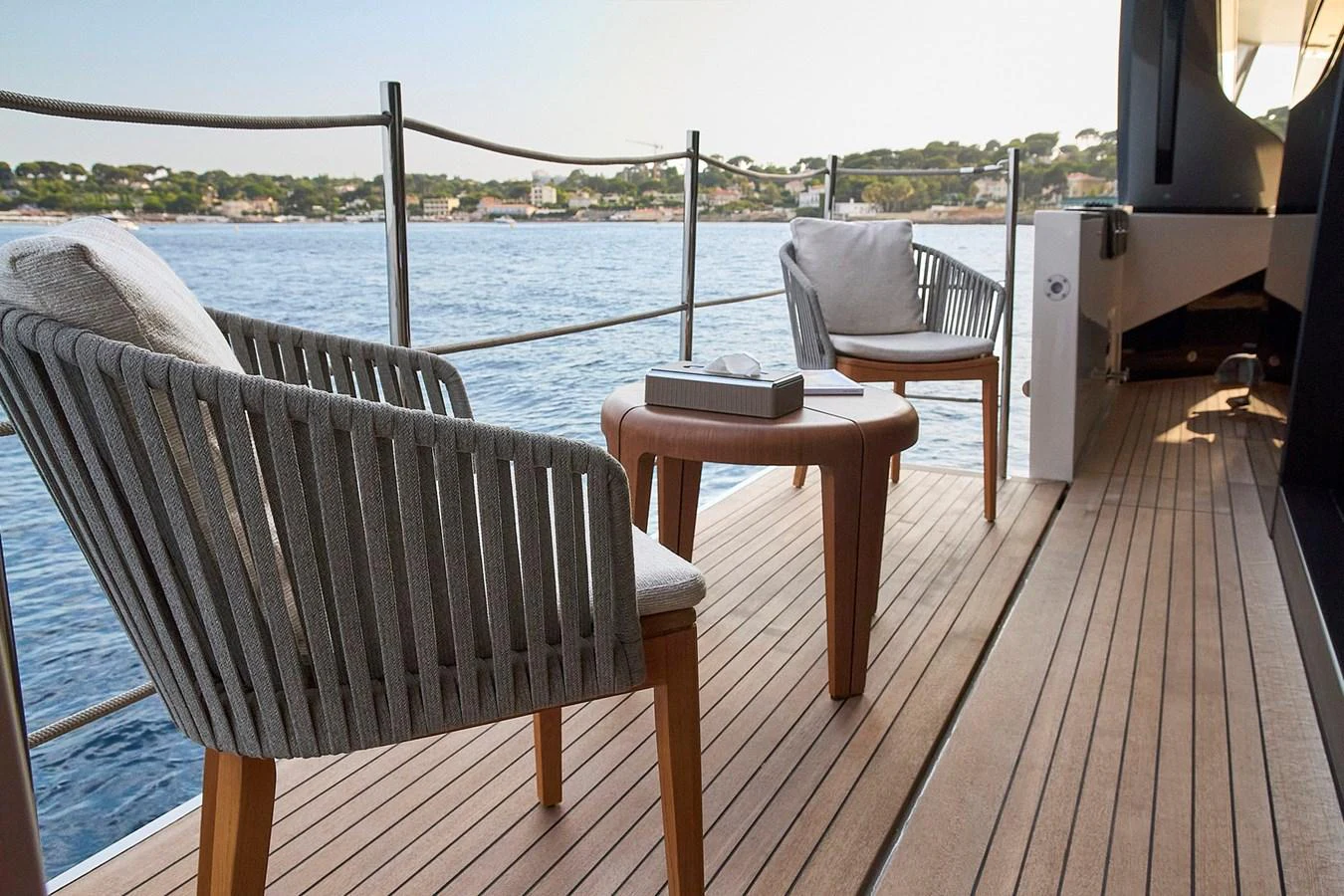 The aft deck offers a serene seating area with a stunning view of the water. aboard SANLORENZO SL102 ASYMMETRIC Yacht for Sale