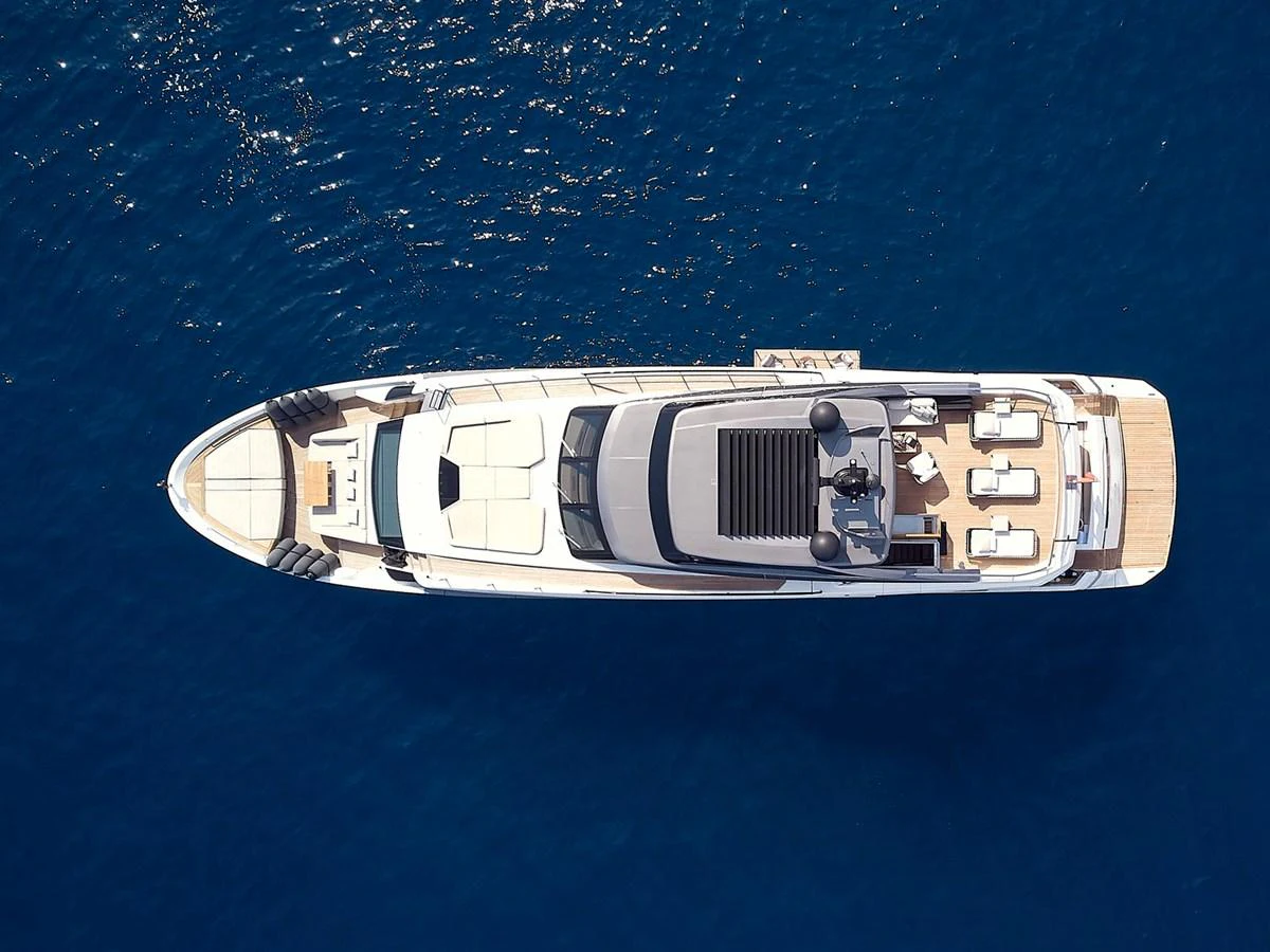 A stunning aerial view of a luxurious yacht cruising on deep blue waters. aboard SANLORENZO SL102 ASYMMETRIC Yacht for Sale