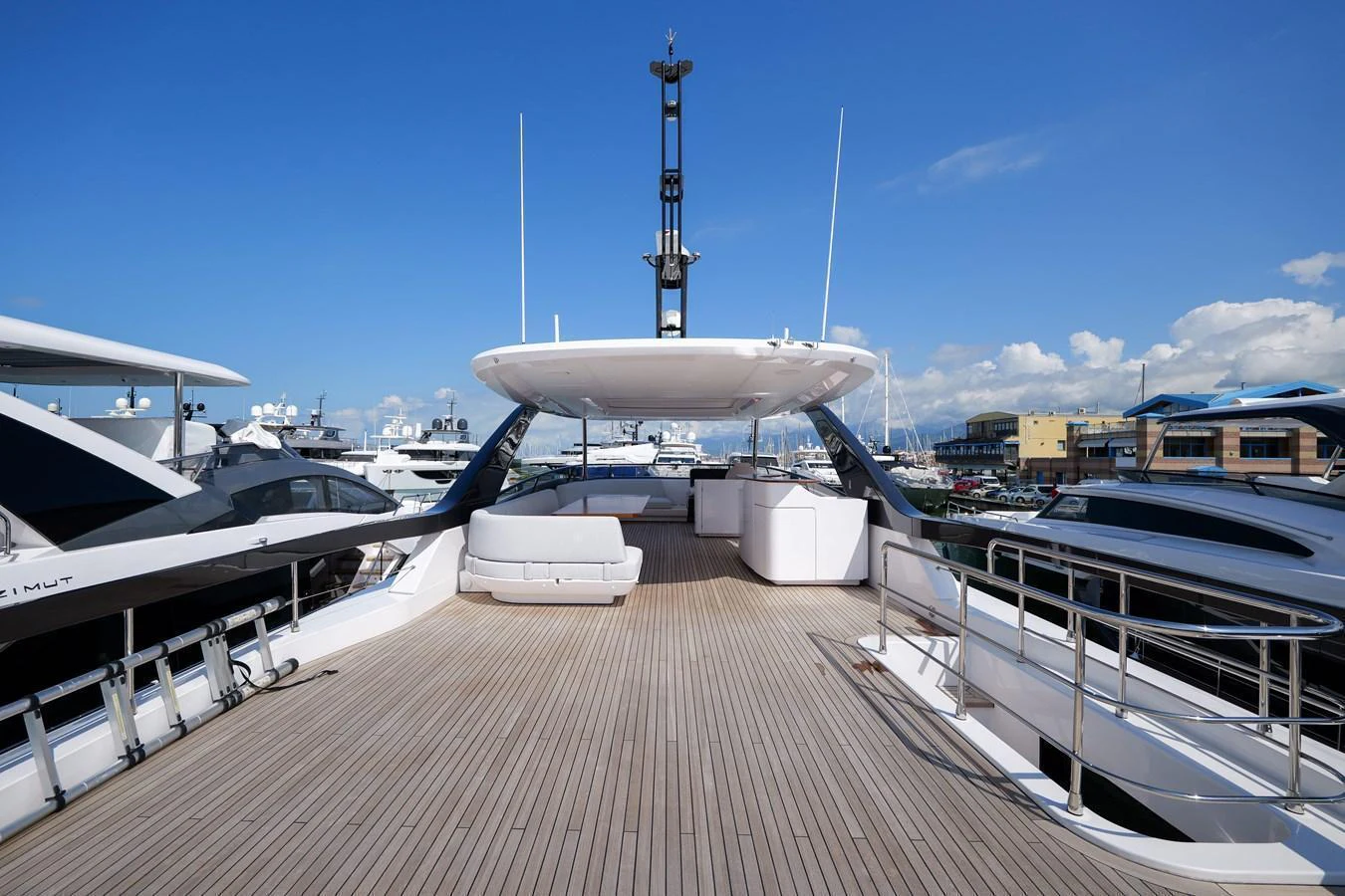 The spacious flybridge offers ample seating and stunning views, perfect for relaxation and entertainment. aboard SEA STAR Yacht for Sale
