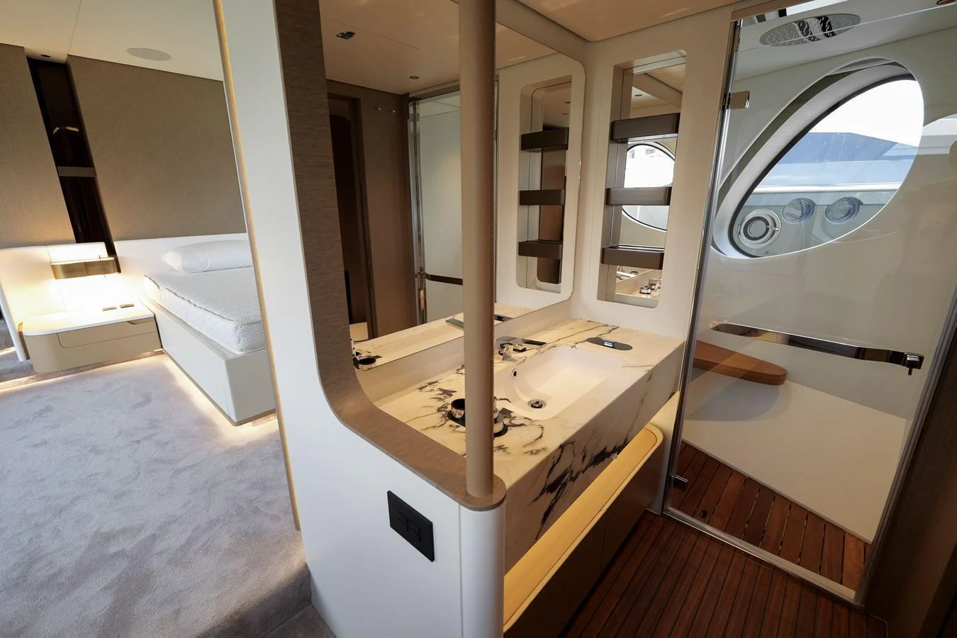 The image showcases a luxurious stateroom with a modern design and high-end finishes. aboard SEA STAR Yacht for Sale