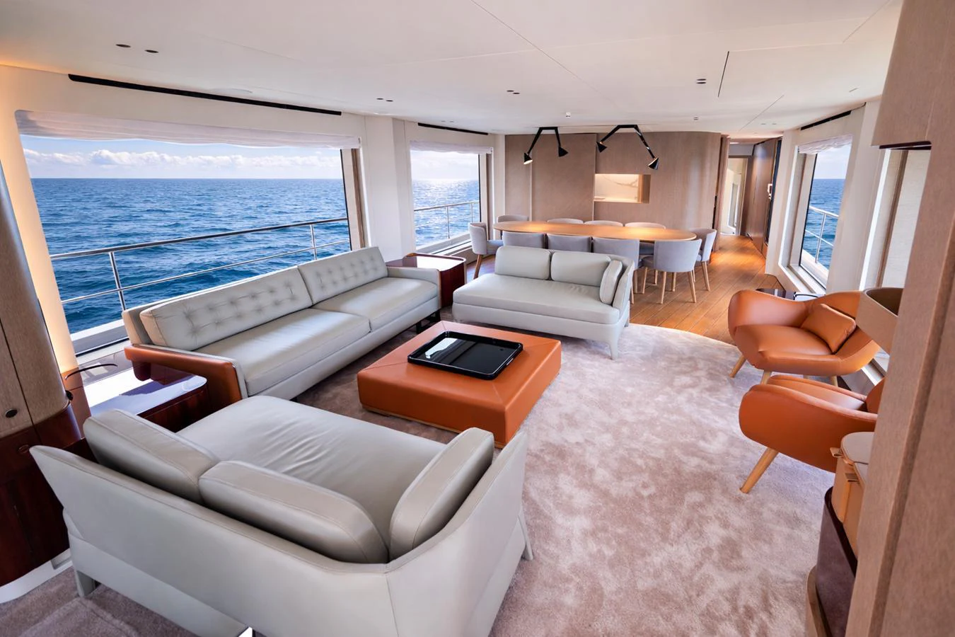 The salon boasts luxurious seating with panoramic ocean views. aboard SEA STAR Yacht for Sale