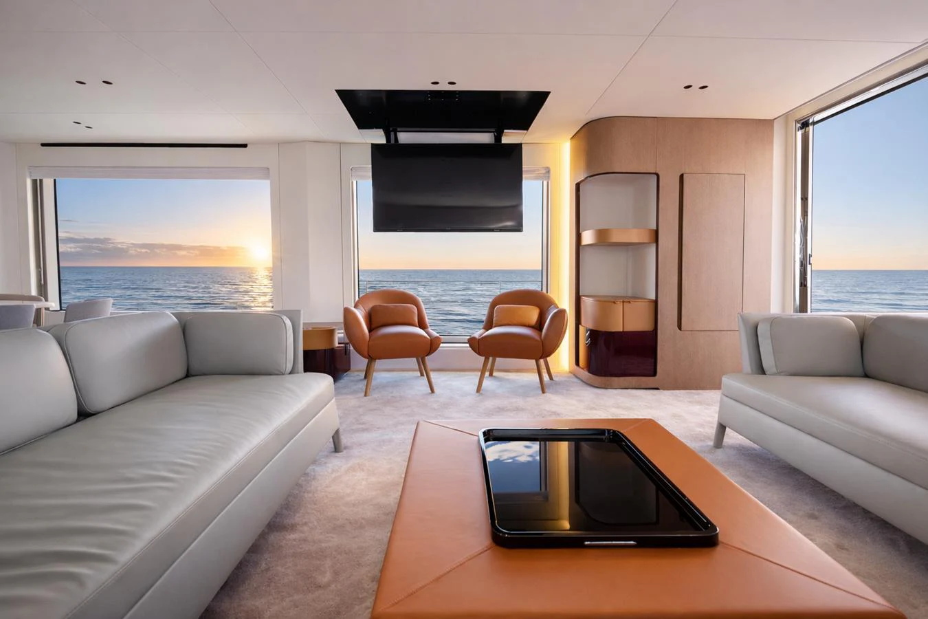 The salon offers a luxurious and modern space with panoramic ocean views. aboard SEA STAR Yacht for Sale