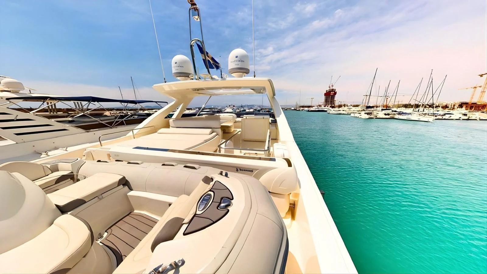 The yacht's flybridge offers a spacious and luxurious area for relaxation with stunning views of the marina. aboard M/Y ILAV Yacht for Sale