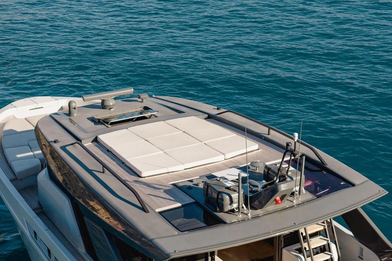 The yacht's flybridge offers a spacious sunbathing area with a stunning view of the surrounding waters. aboard EOLINO Yacht for Sale