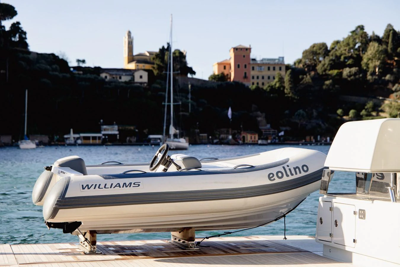 A sleek tender is docked on the yacht's deck, ready for an excursion. aboard EOLINO Yacht for Sale