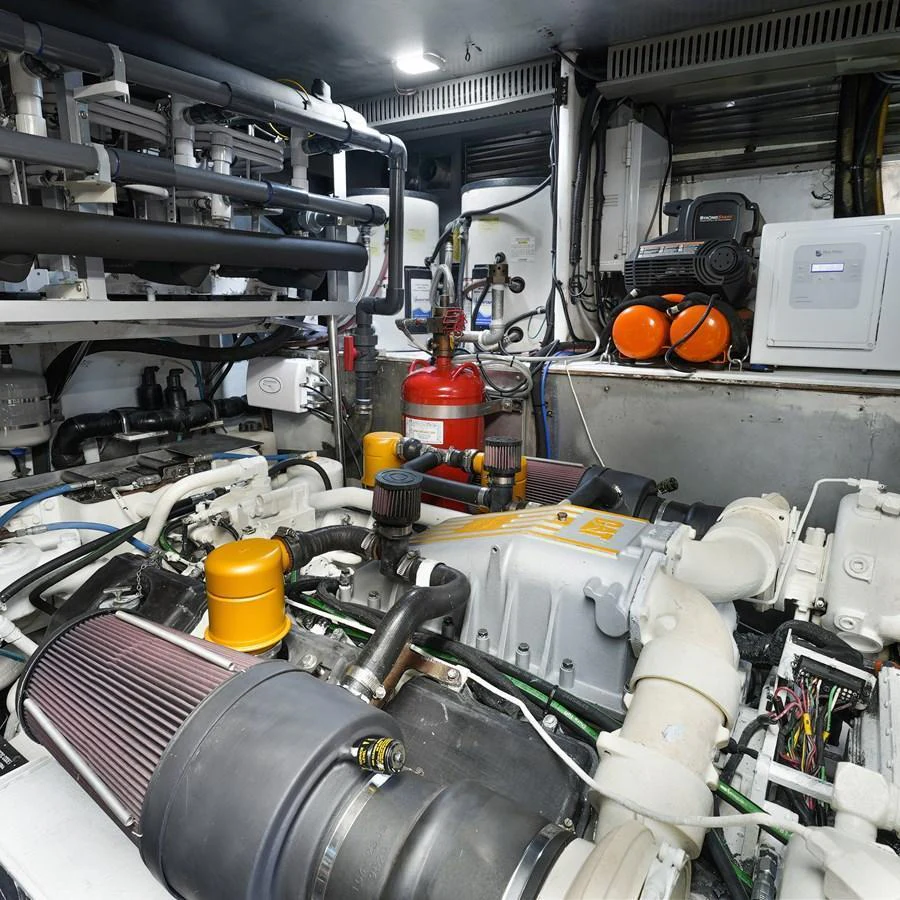 The engine room showcases the yacht's powerful and well-maintained machinery. aboard MILES AWEIGH Yacht for Sale