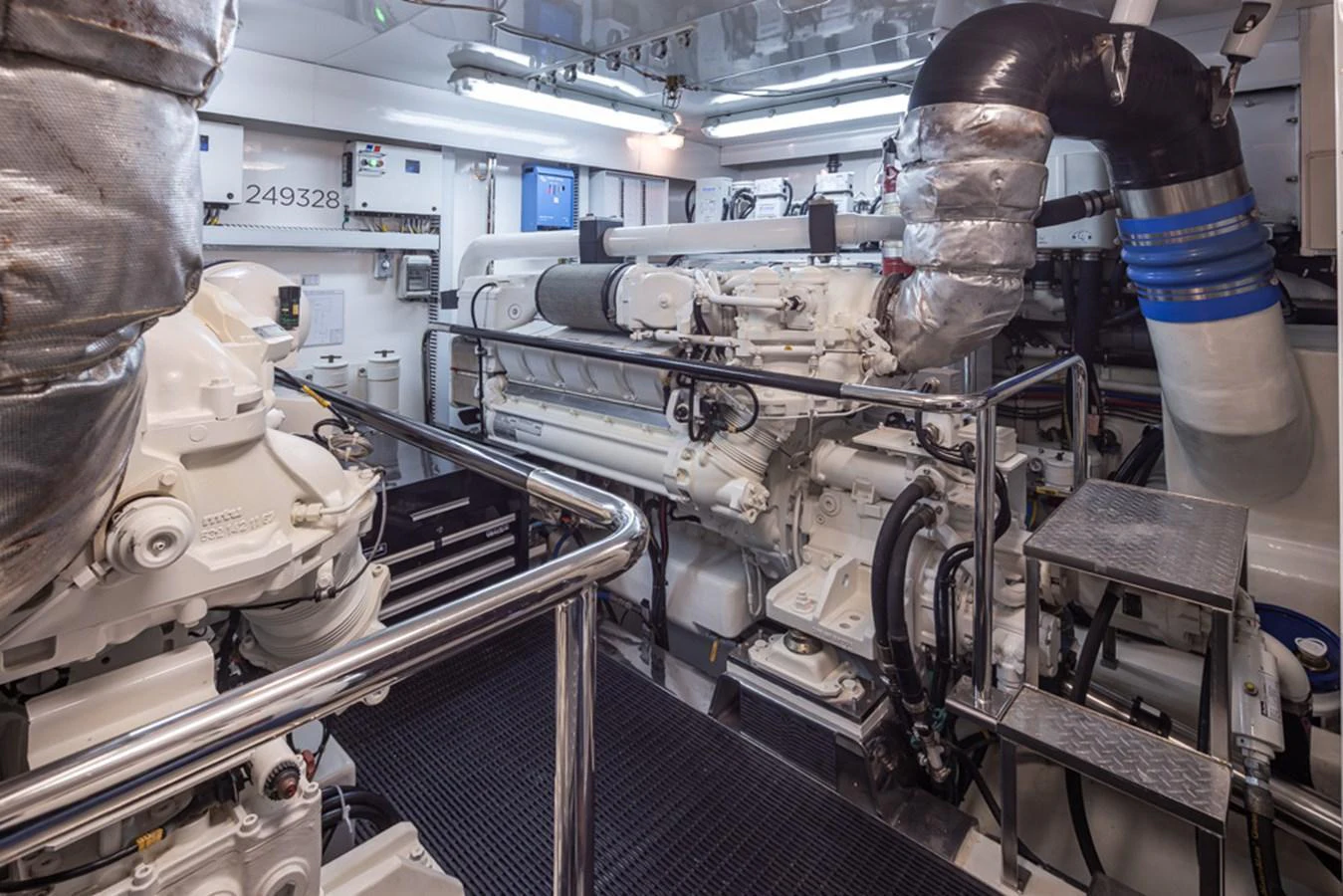 The image showcases the yacht's engine room with well-maintained machinery and equipment. aboard RHONDAVOUS Yacht for Sale