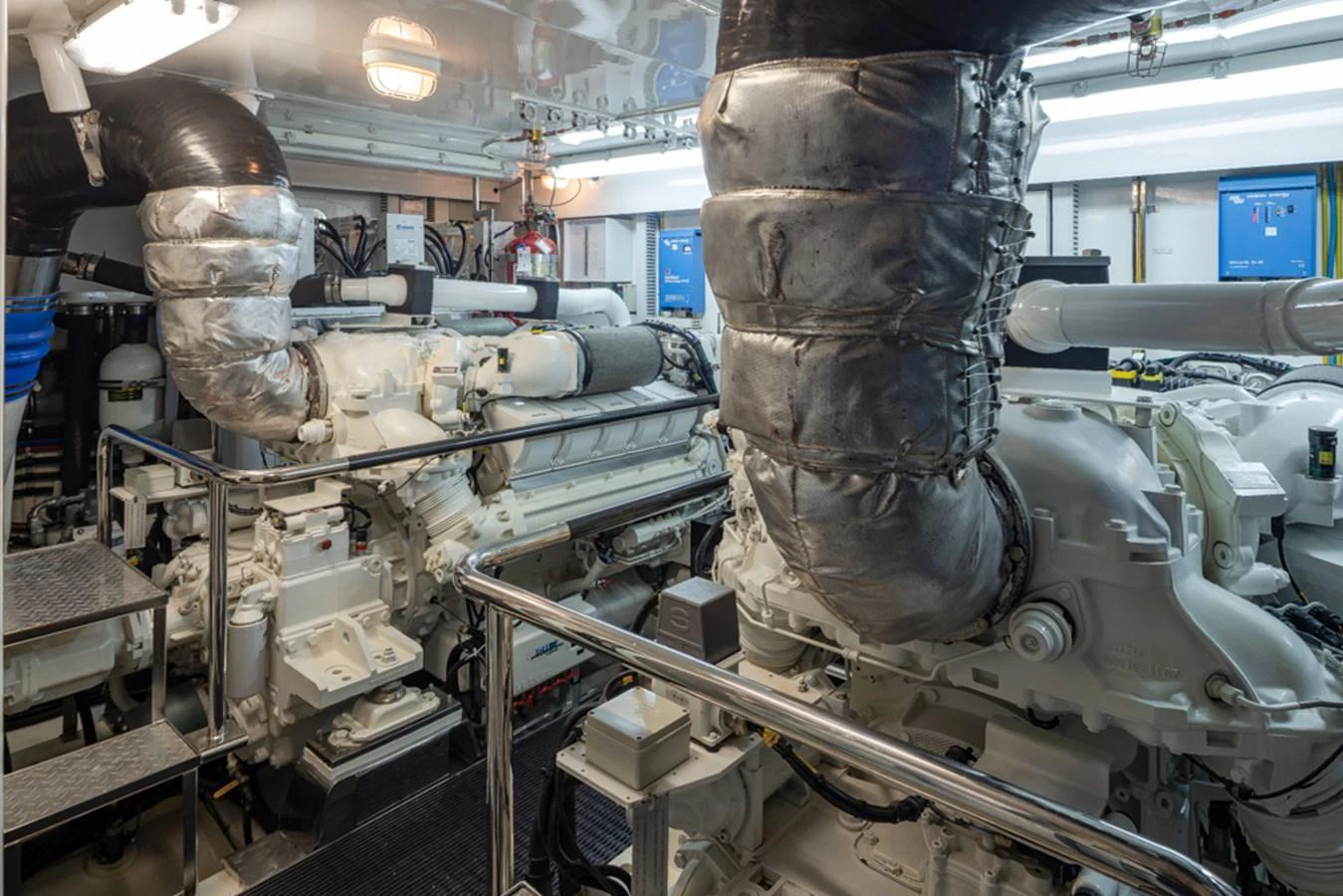 The image showcases the well-maintained engine room of the yacht, highlighting its powerful machinery and clean setup. aboard RHONDAVOUS Yacht for Sale