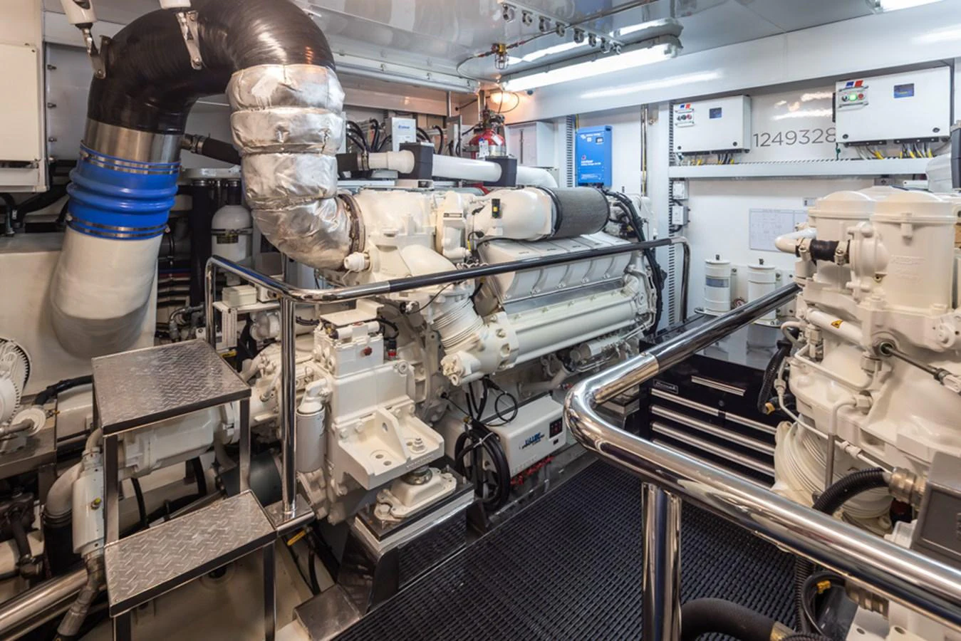 The yacht's engine room showcases powerful machinery and a well-organized layout. aboard RHONDAVOUS Yacht for Sale