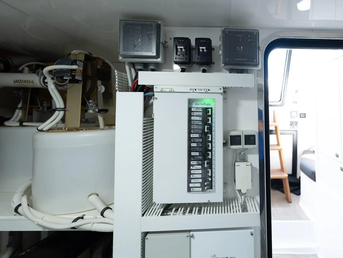 The image showcases the technical area of the yacht, featuring electrical panels and equipment. aboard SUB-PAR Yacht for Sale