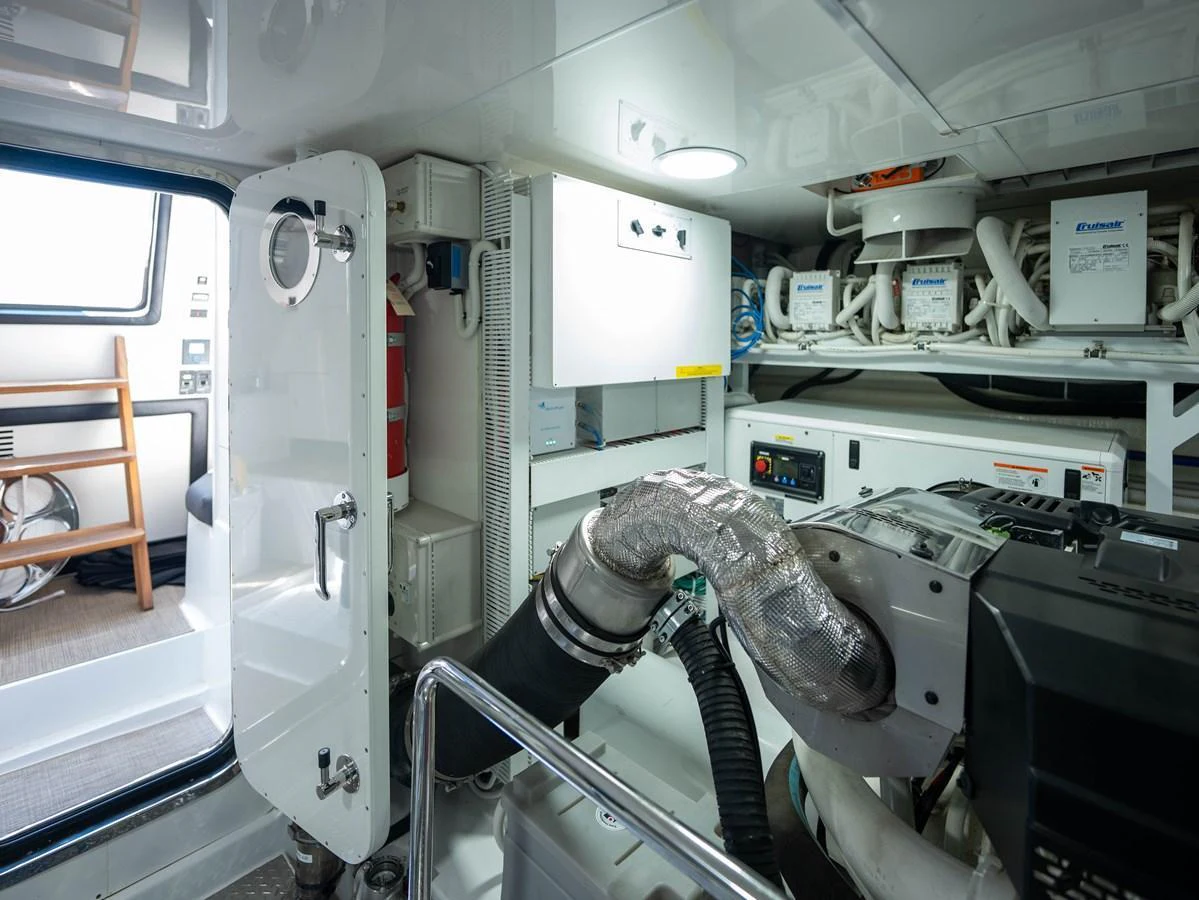 The yacht's engine room is equipped with advanced machinery and systems for optimal performance. aboard SUB-PAR Yacht for Sale