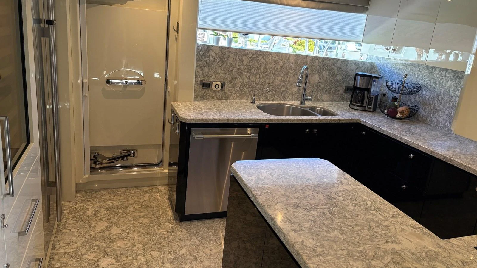 The galley features modern appliances and ample counter space for meal preparation. aboard BELLA LISA Yacht for Sale