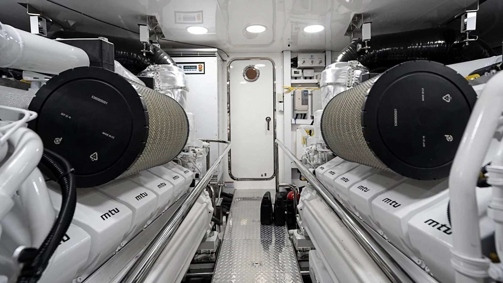 The engine room showcases powerful MTU engines and a well-organized layout. aboard BELLA LISA Yacht for Sale