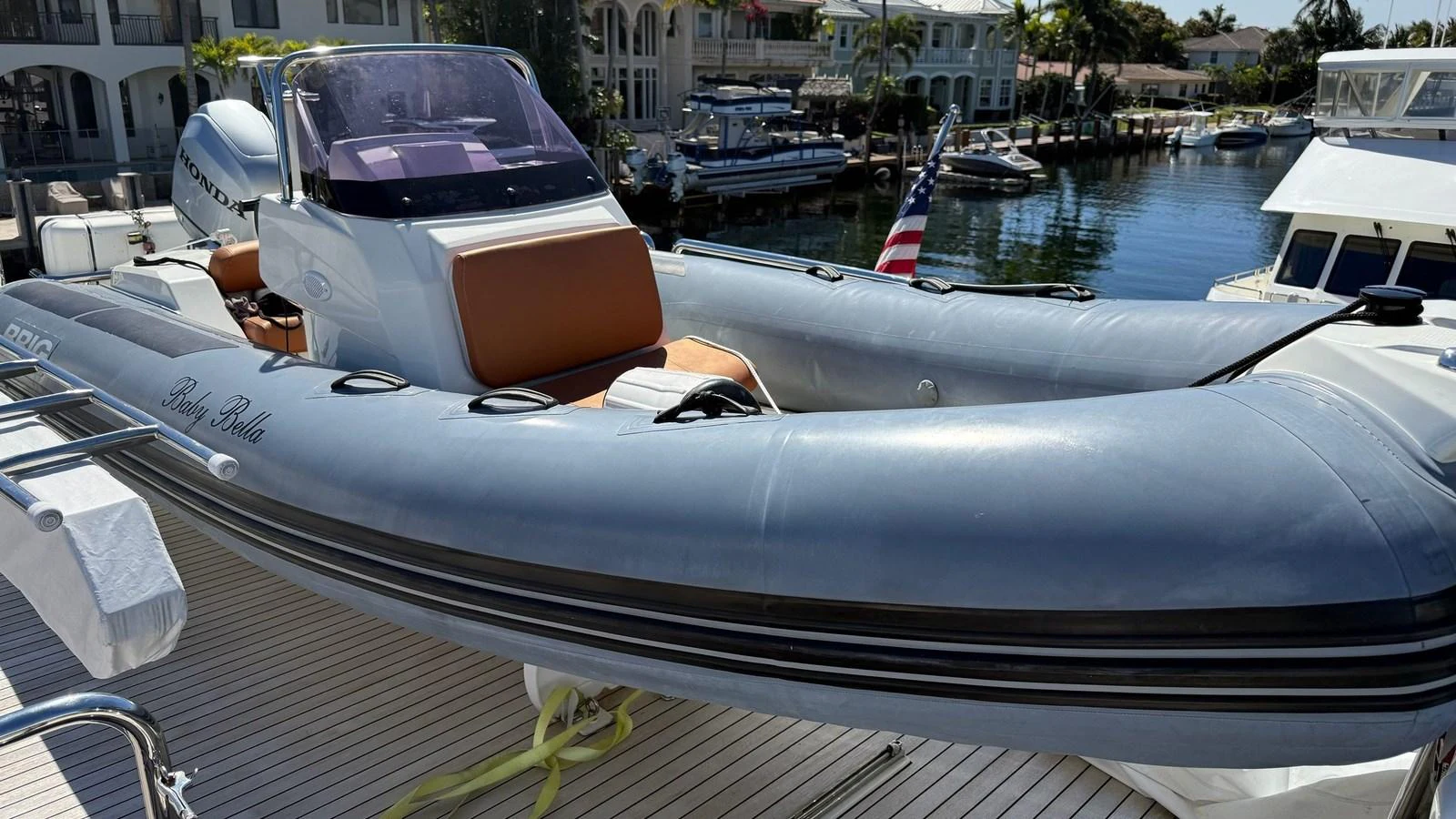 A sleek and modern tender is docked, ready for use. aboard BELLA LISA Yacht for Sale