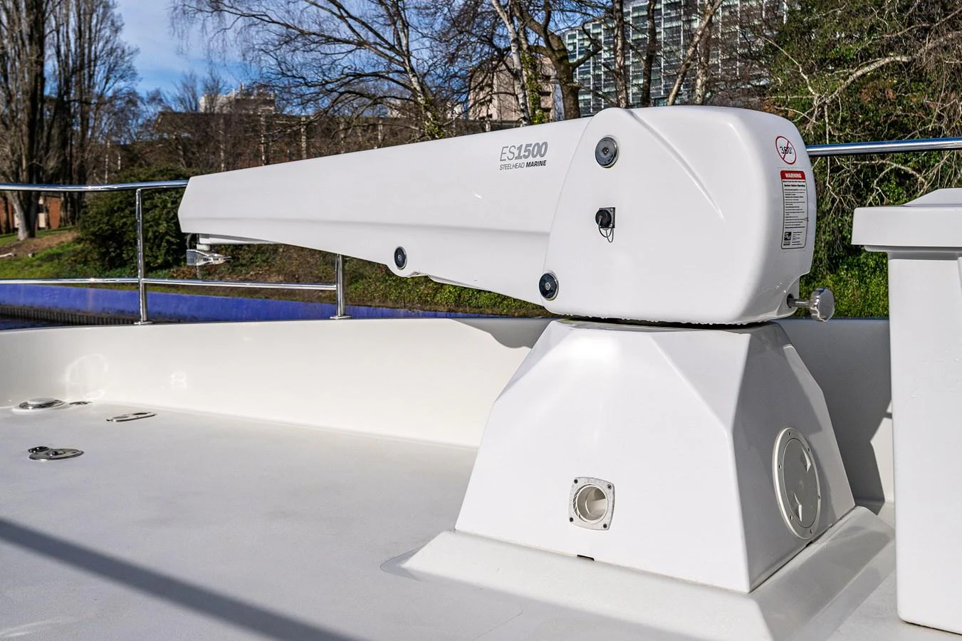The image showcases a detailed view of a yacht's anchor windlass system on deck. aboard ISLAND BREEZE Yacht for Sale