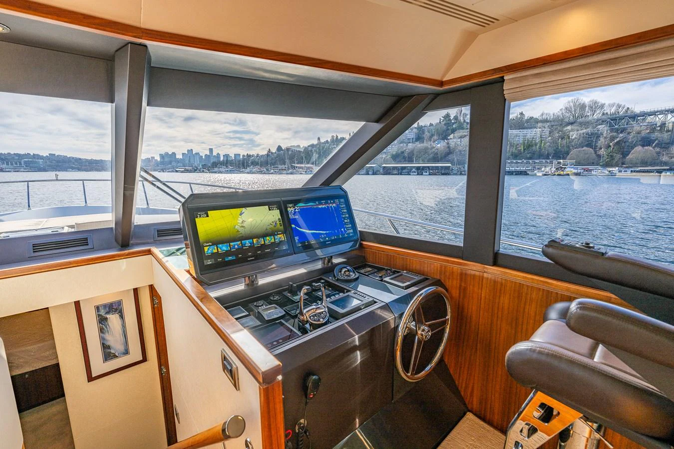 The helm station offers a panoramic view with state-of-the-art navigation equipment. aboard ISLAND BREEZE Yacht for Sale