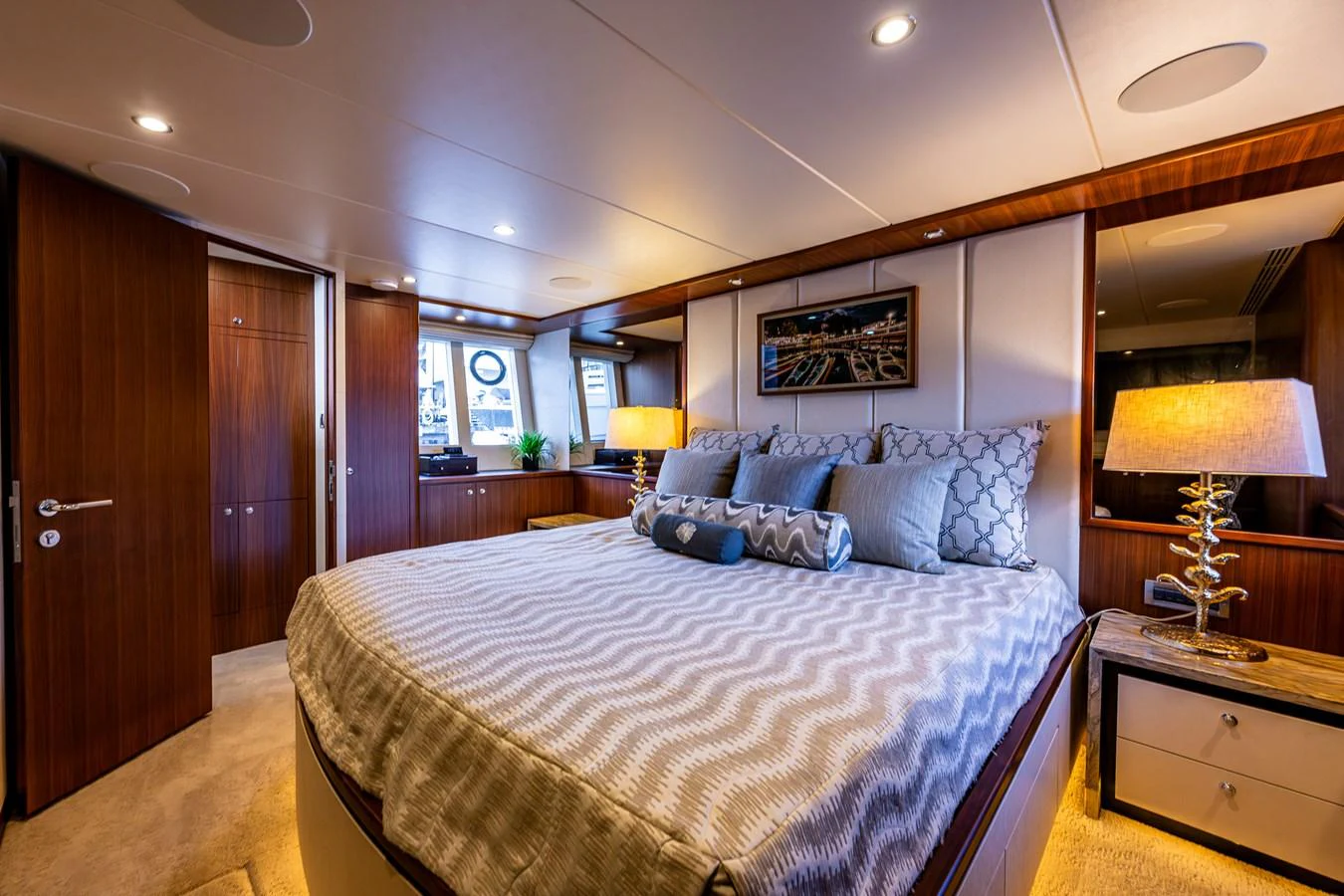 The stateroom offers a luxurious and cozy retreat with elegant decor and ample natural light. aboard ISLAND BREEZE Yacht for Sale