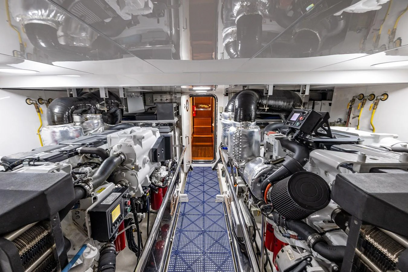 The engine room showcases the yacht's powerful and meticulously maintained machinery. aboard ISLAND BREEZE Yacht for Sale