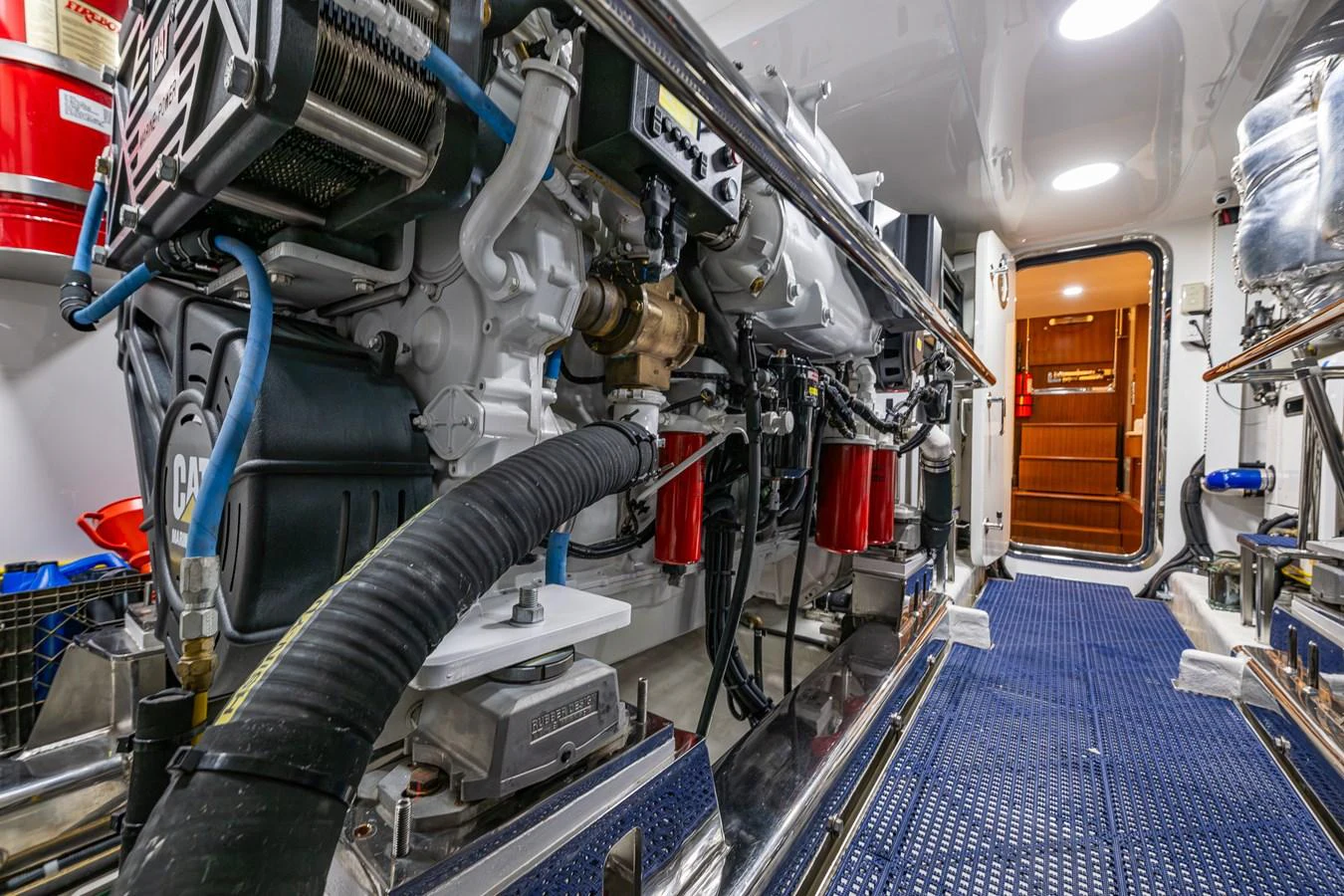 The image showcases the well-maintained engine room of the yacht, highlighting its advanced machinery and clean setup. aboard ISLAND BREEZE Yacht for Sale