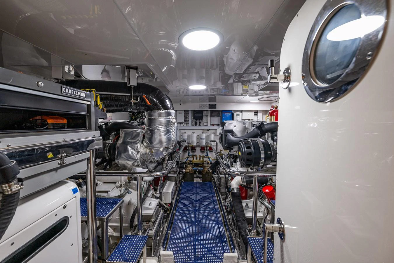 The engine room is meticulously organized, showcasing advanced machinery and equipment. aboard ISLAND BREEZE Yacht for Sale