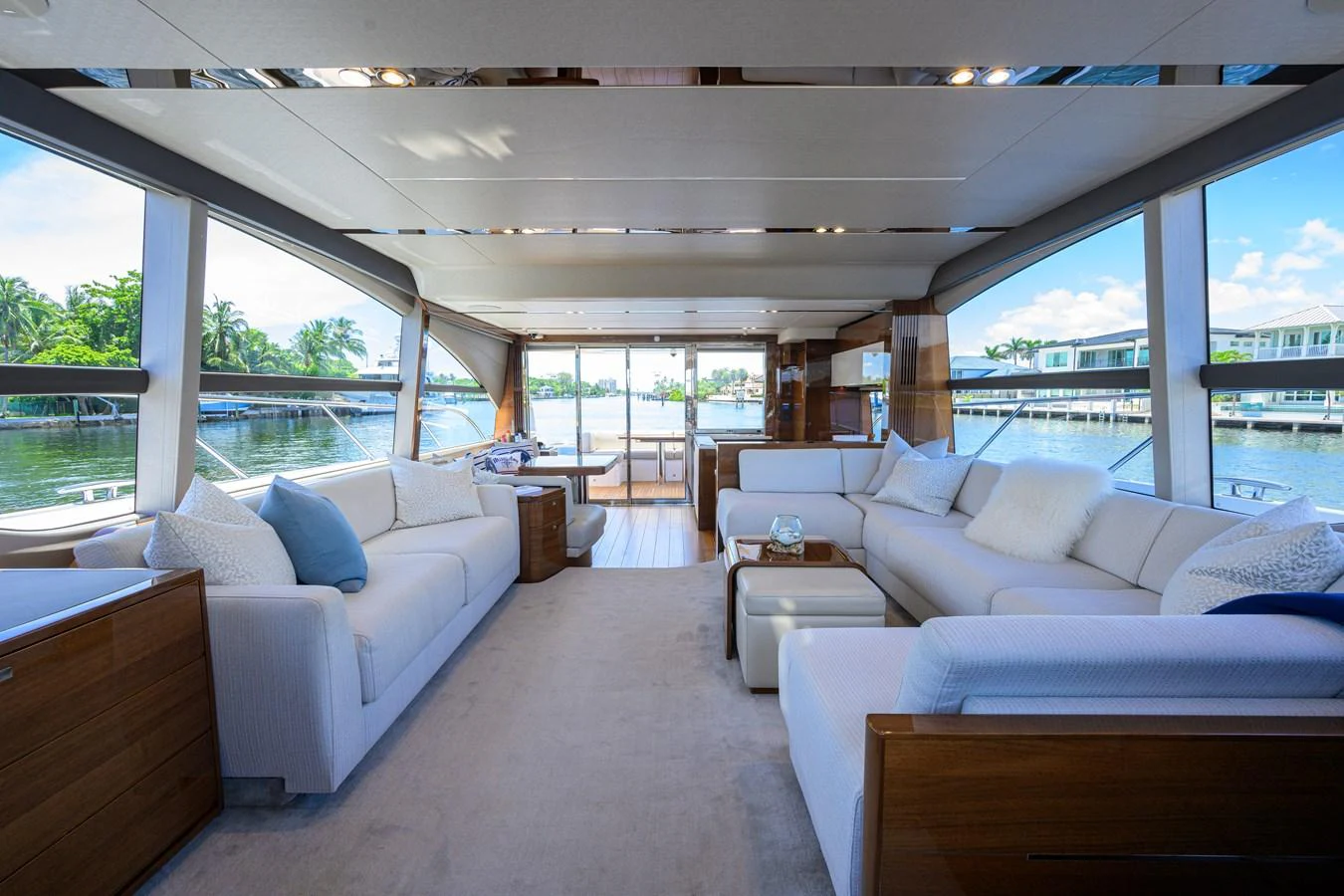 The salon offers a spacious and luxurious seating area with panoramic views. aboard MISS AMY Yacht for Sale