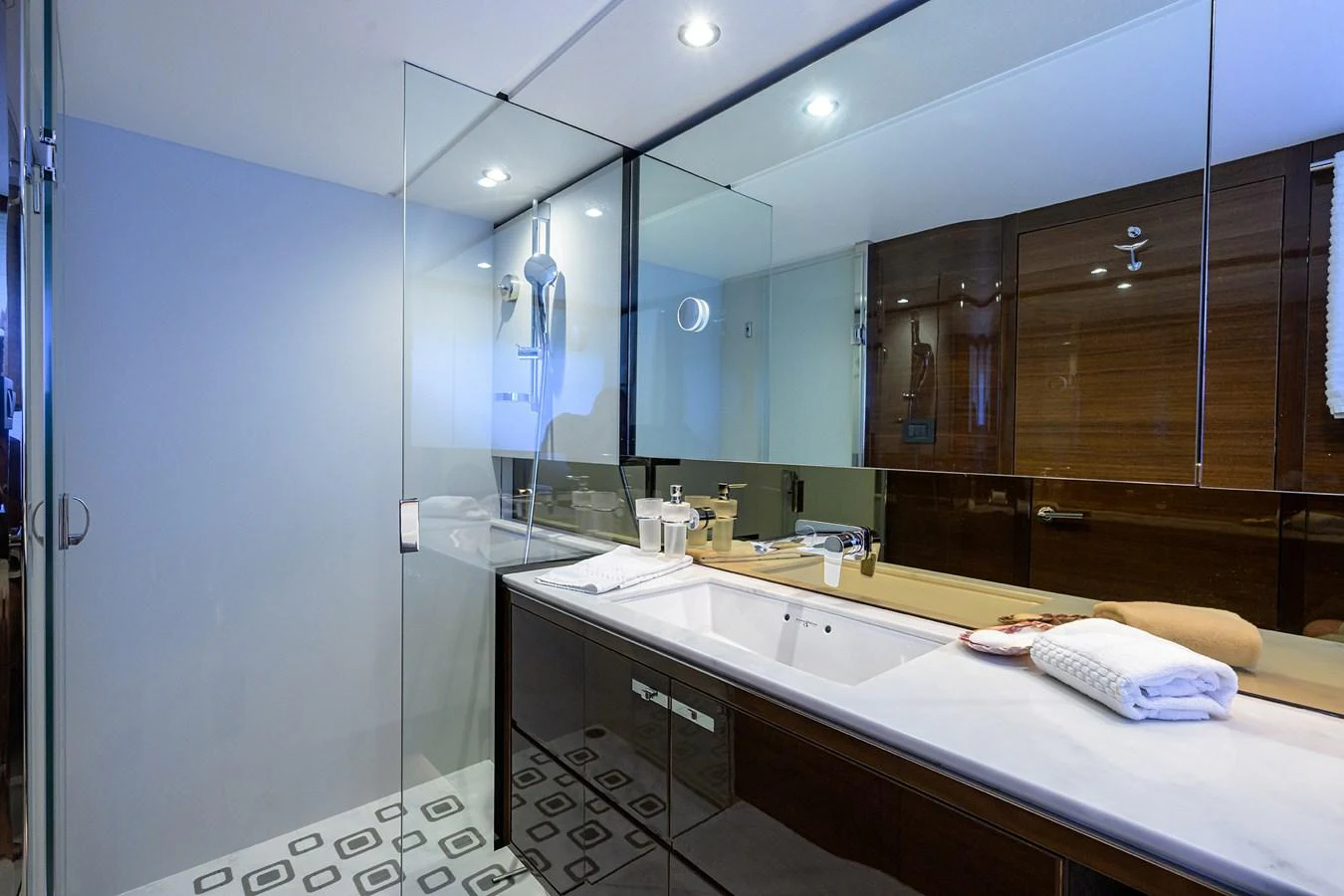 A modern yacht bathroom featuring sleek fixtures and ample counter space. aboard MISS AMY Yacht for Sale