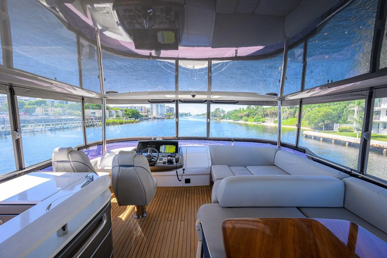 The helm area offers panoramic views with comfortable seating and modern navigation equipment. aboard MISS AMY Yacht for Sale