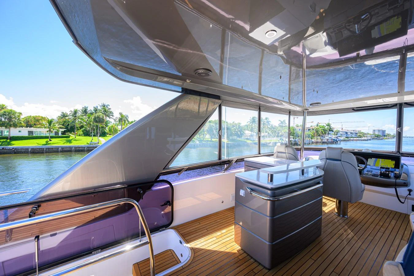 The helm area offers a sleek and modern design with panoramic views and luxurious finishes. aboard MISS AMY Yacht for Sale