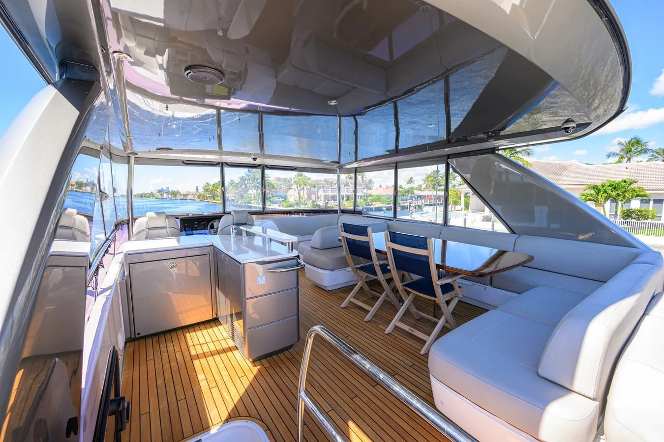 The flybridge offers a spacious and luxurious seating area with panoramic views. aboard MISS AMY Yacht for Sale