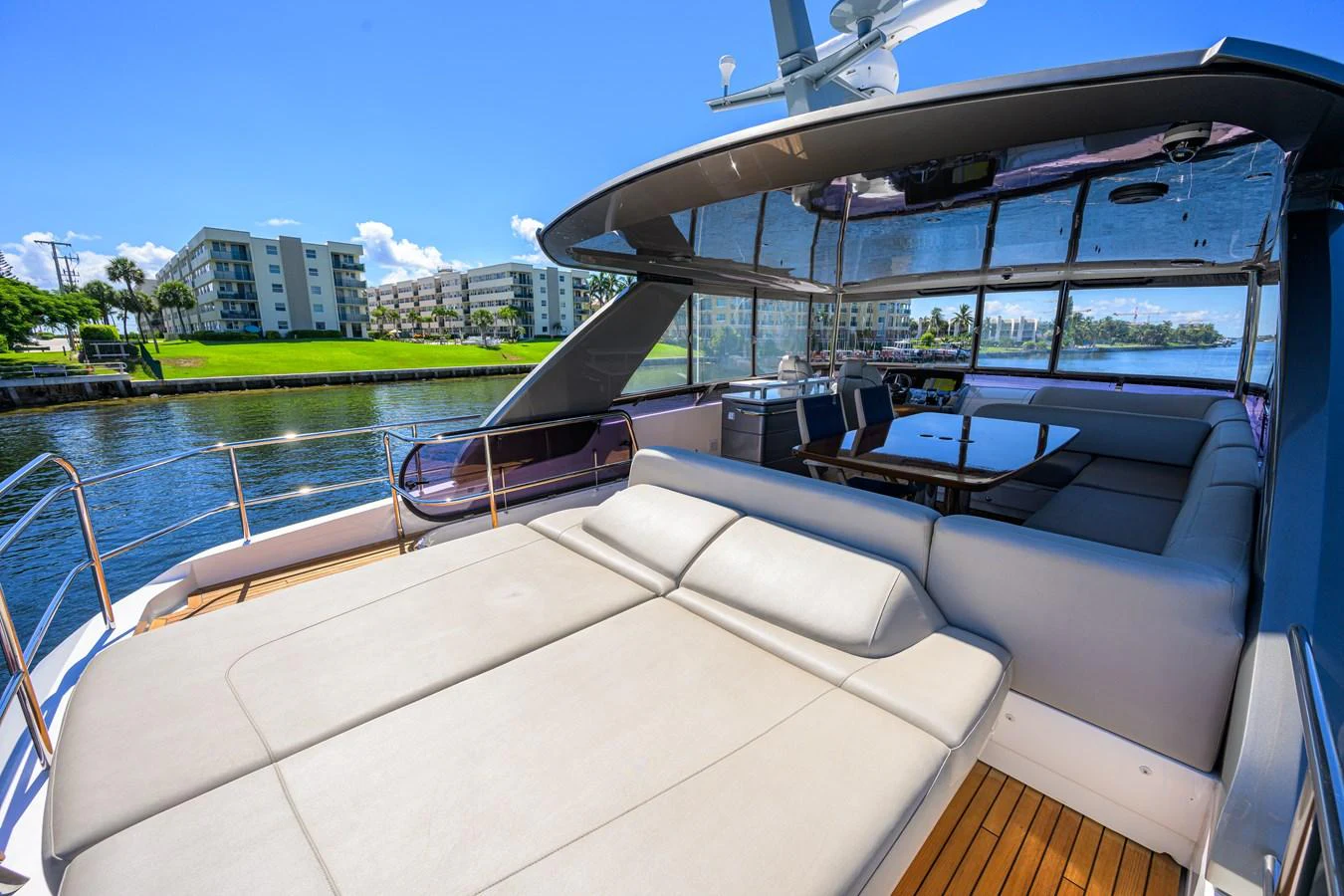 The aft deck offers a spacious and luxurious lounging area with comfortable seating and scenic views. aboard MISS AMY Yacht for Sale