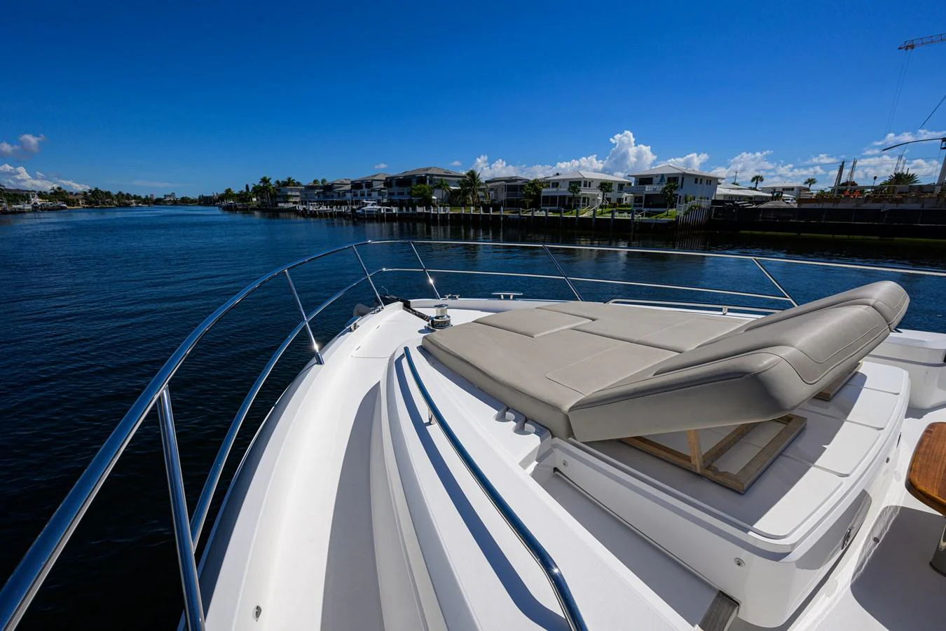 The yacht's foredeck features a spacious sunbathing area with plush cushions, perfect for relaxation. aboard MISS AMY Yacht for Sale