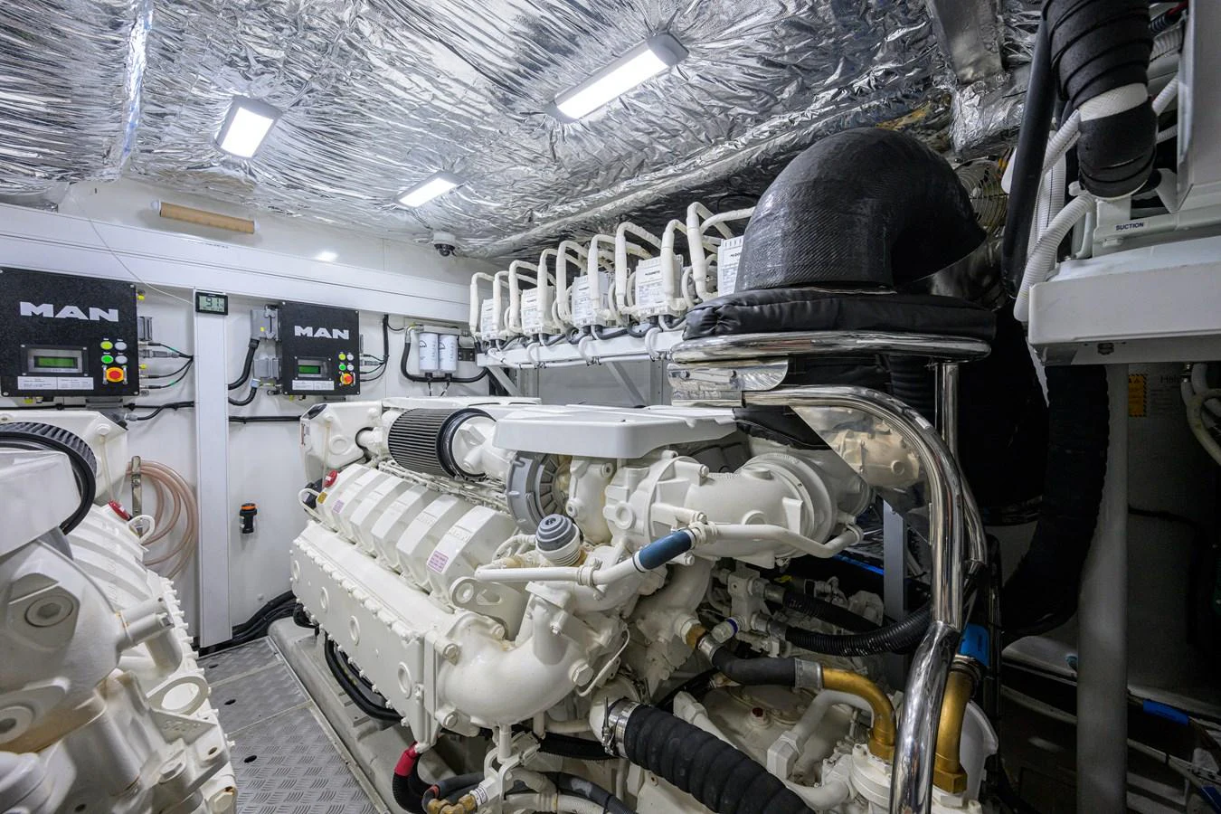 The engine room showcases powerful and meticulously maintained machinery. aboard MISS AMY Yacht for Sale