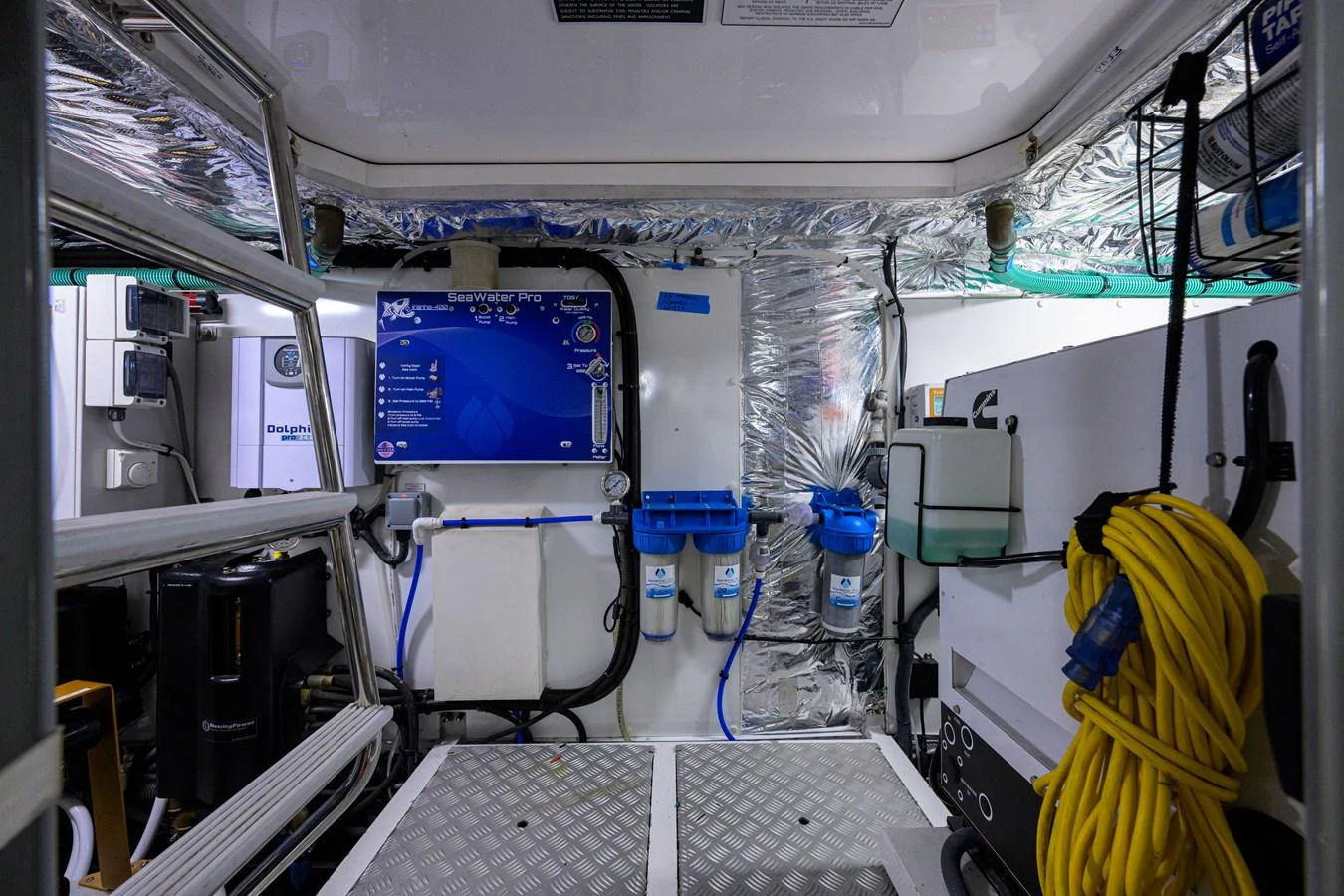 The image showcases a well-organized engine room with various technical equipment and tools. aboard MISS AMY Yacht for Sale
