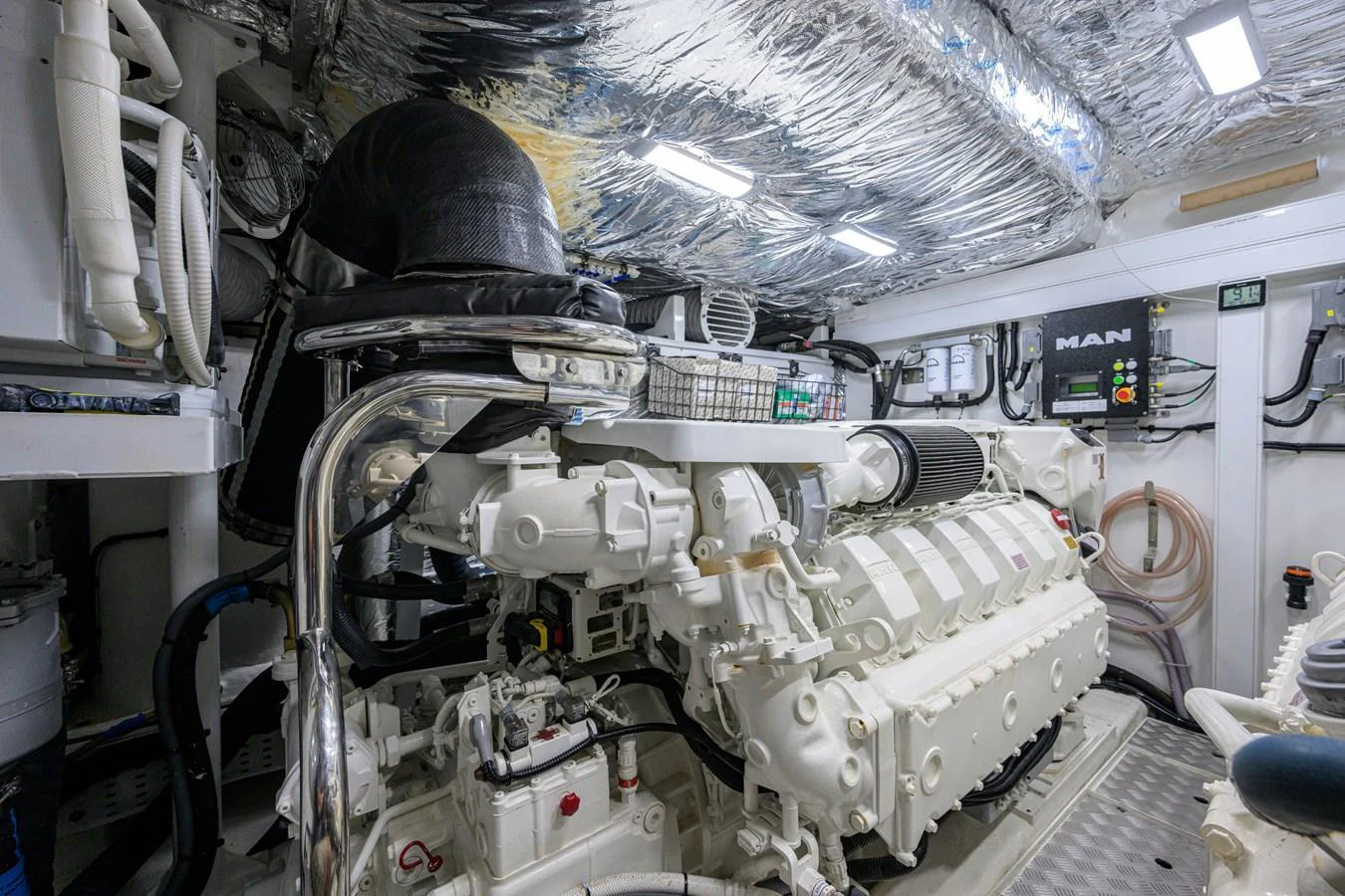 The image showcases the yacht's well-maintained engine room with advanced machinery and equipment. aboard MISS AMY Yacht for Sale